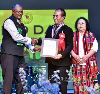 Presenting recognition to Chief Minister Pu Lalduhoma of Mizoram on Mizo Day